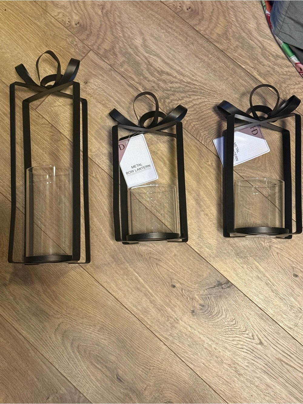 Black Metal Bow Lantern Wall Sconce -